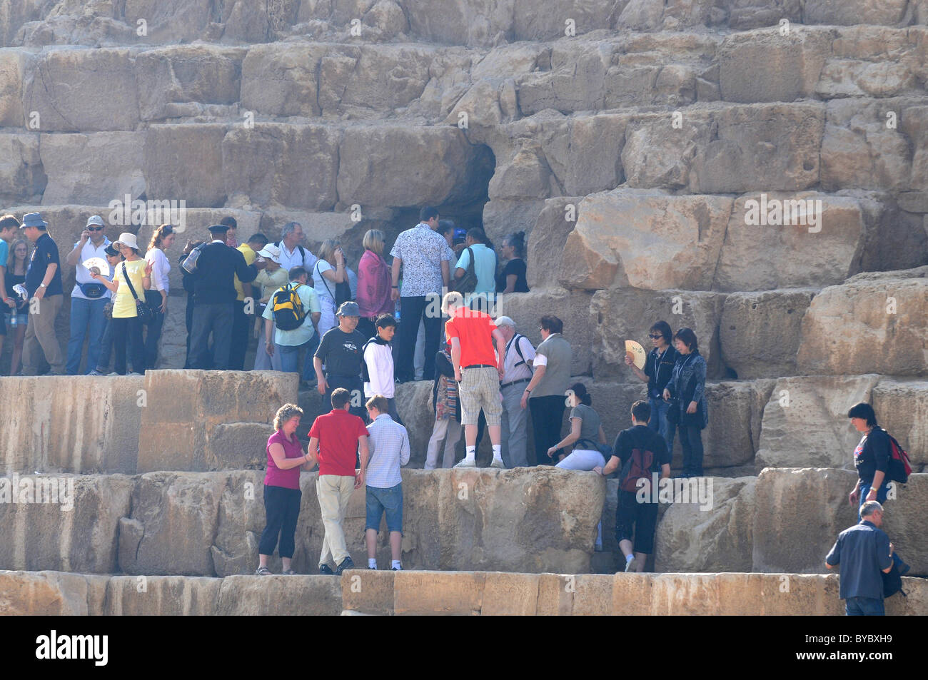 Pyramid, Giza, Egypt, tourists climb on the only open Pyramid, Giza, Egypt Stock Photo