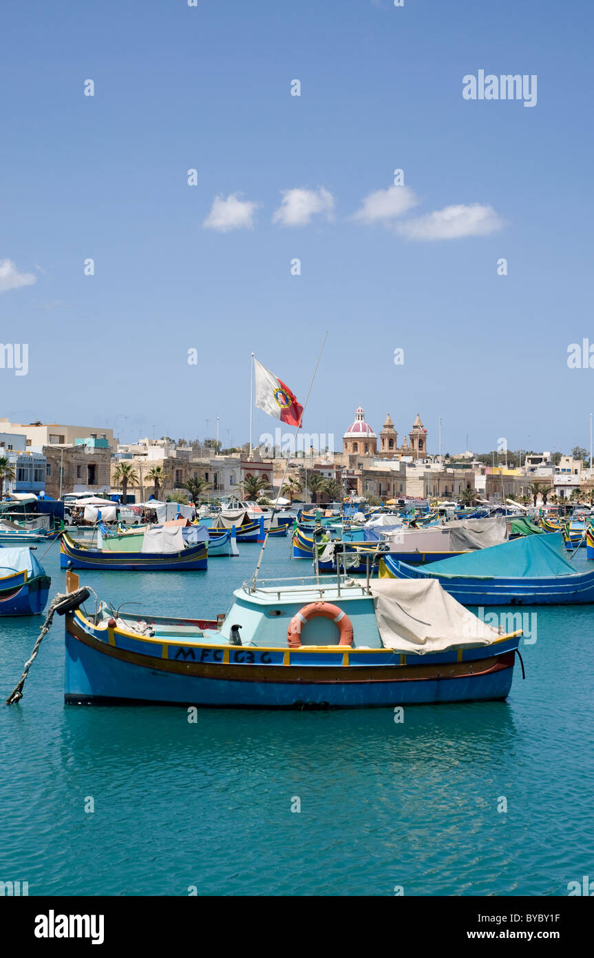 Marsaxlokk Malta largest fishing village accommodating 250 registered fishing vessels Stock Photo