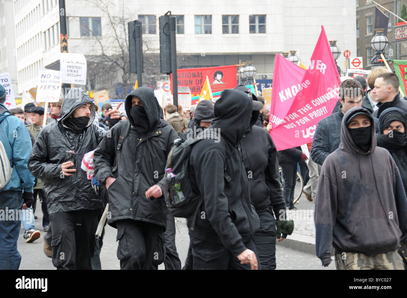 NUS TUC Balaclava and masked protesters Student and Union protest against tuition fees and job losses Stock Photo