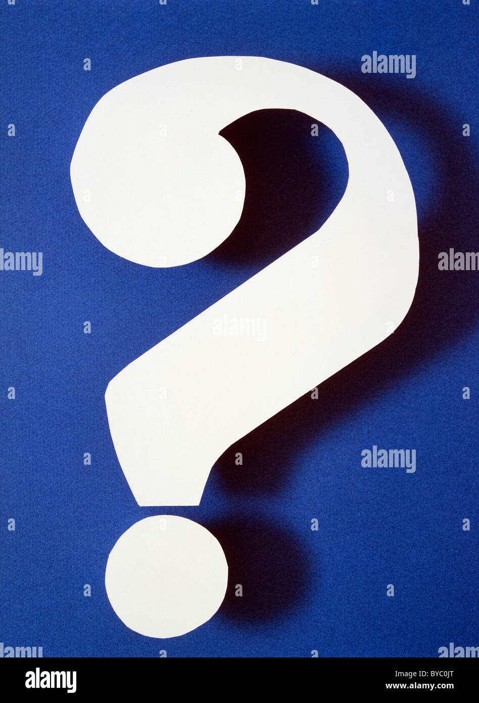 WHITE QUESTION MARK ON BLUE BACKGROUND Stock Photo