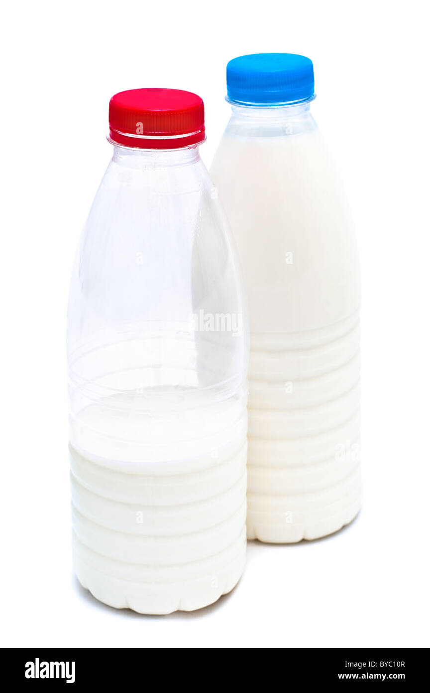 Two white plastic bottles with milk isolated on white background Stock ...