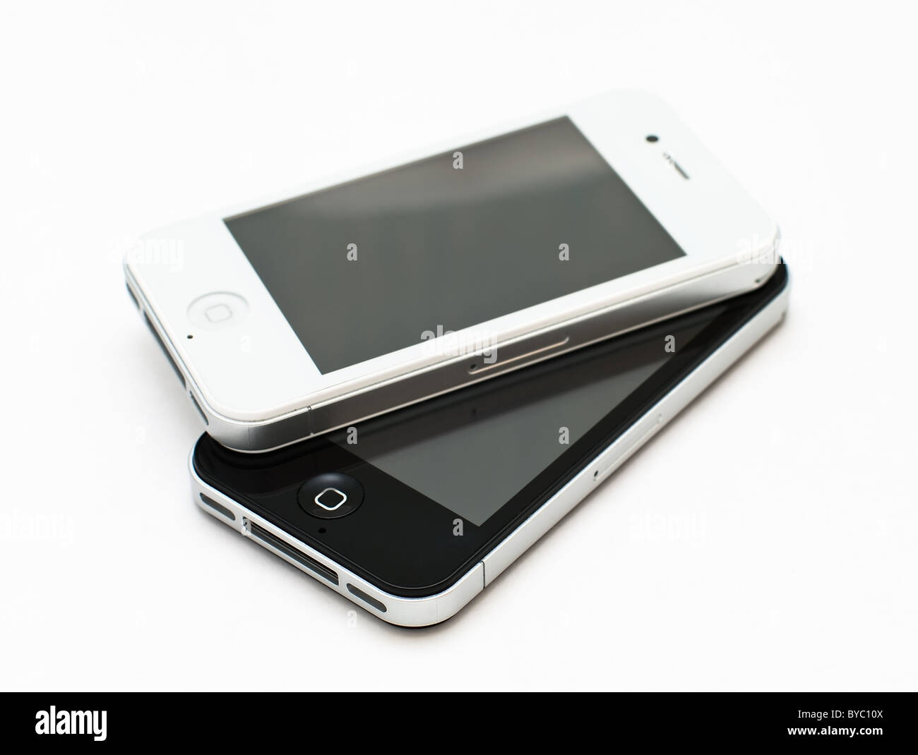 Two iphones 4g black and white isolated on white background. Cut out