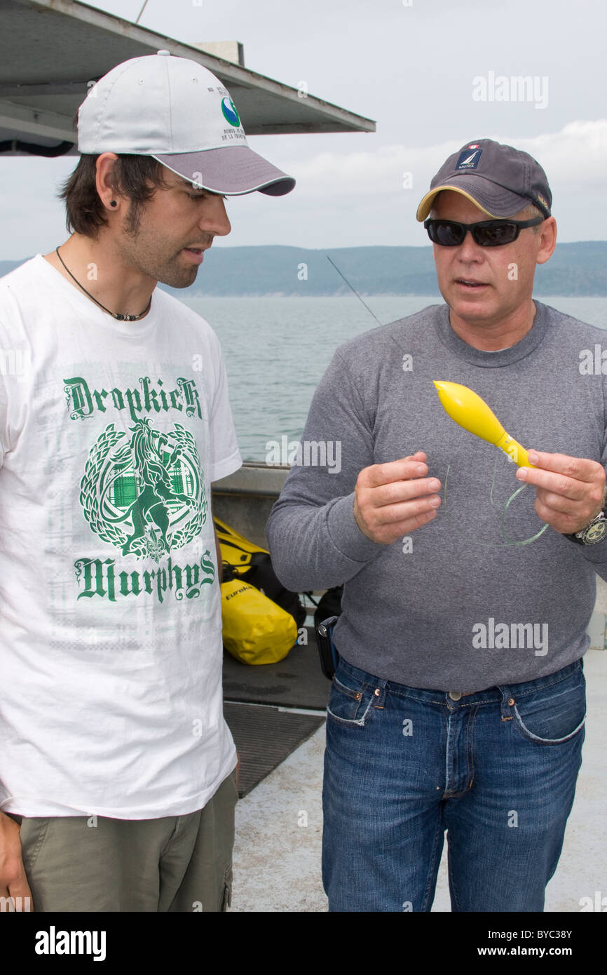 Dr. Steve Turnbull holds a Xeos satellite tag which will be used to track a porbeagle shark Stock Photo