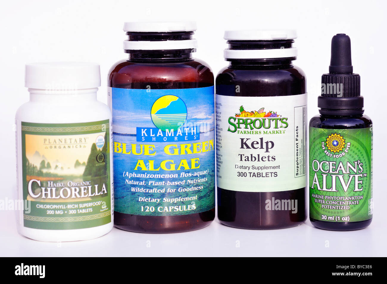 Dietary supplements chlorella tabs, blue green algae caps, kelp tabs