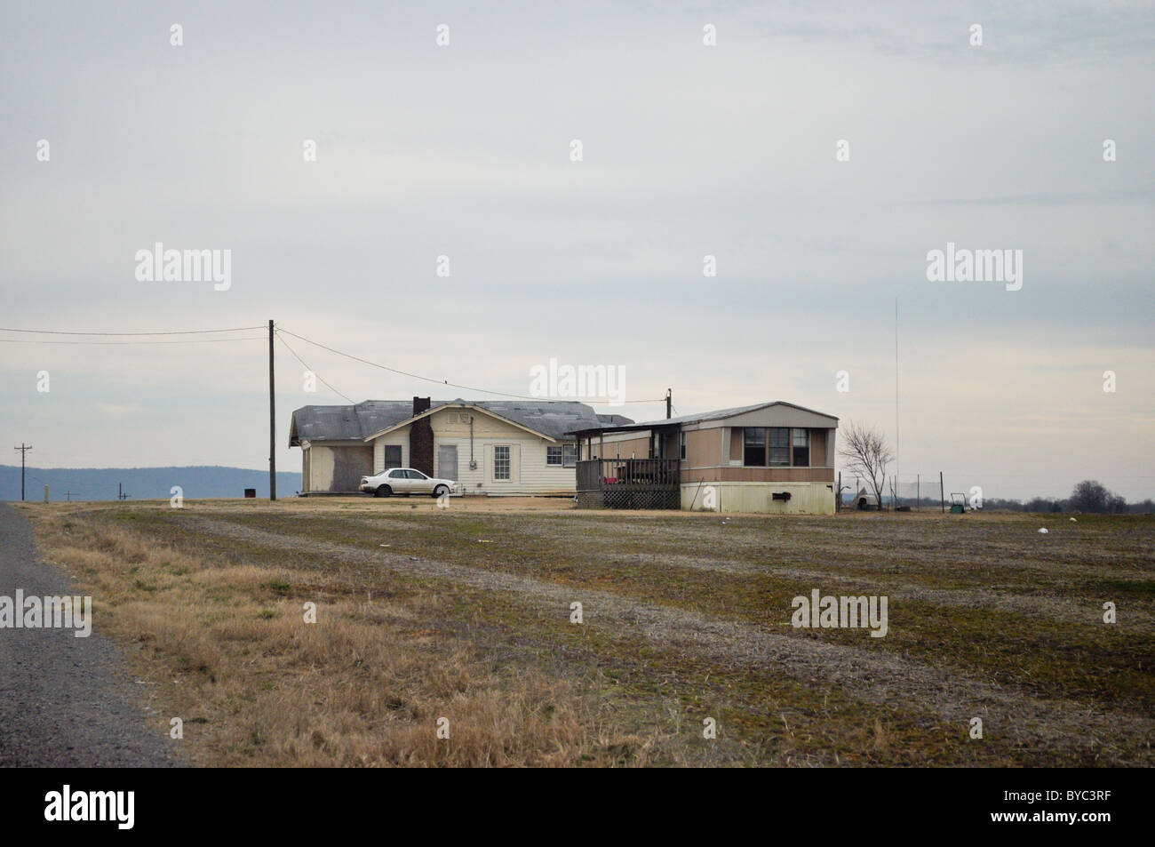 House and trailer in the middle of nowhere. Stock Photo