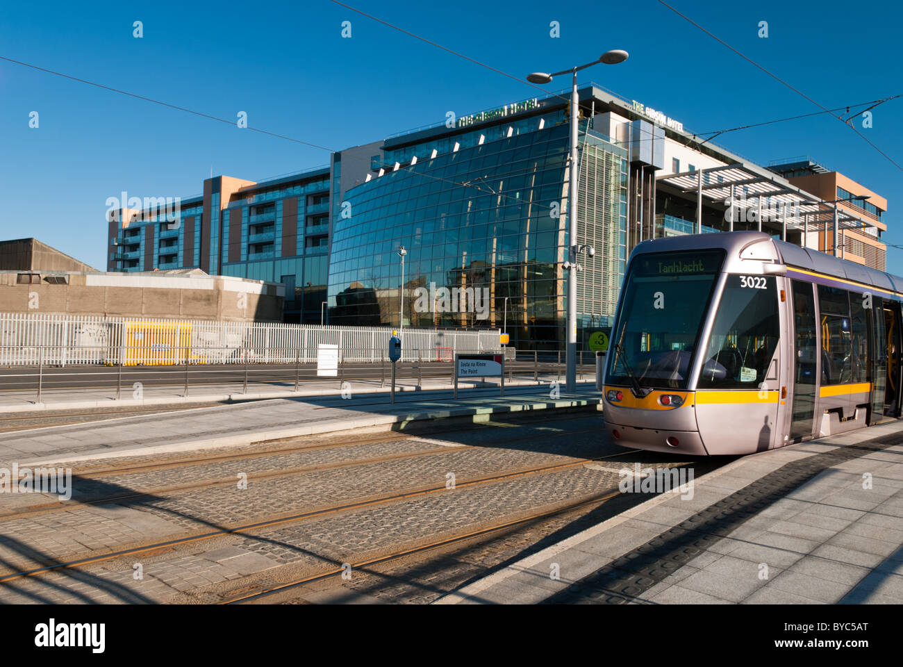 A LUAS Tram outside the Gibson Hotel Stock Photo