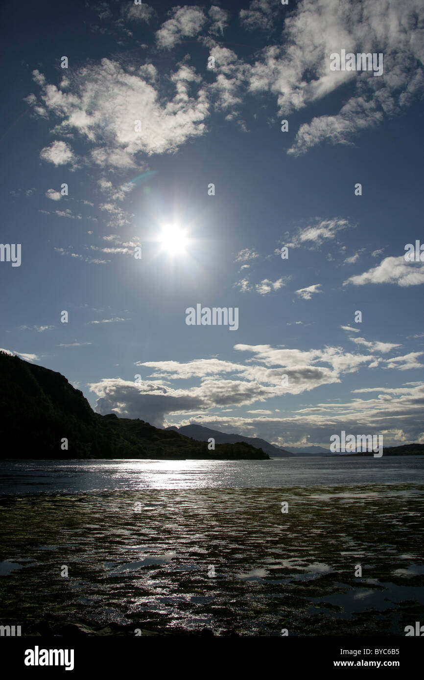 Picturesque silhouetted view of Loch Dornie and Loch Alsh. Stock Photo