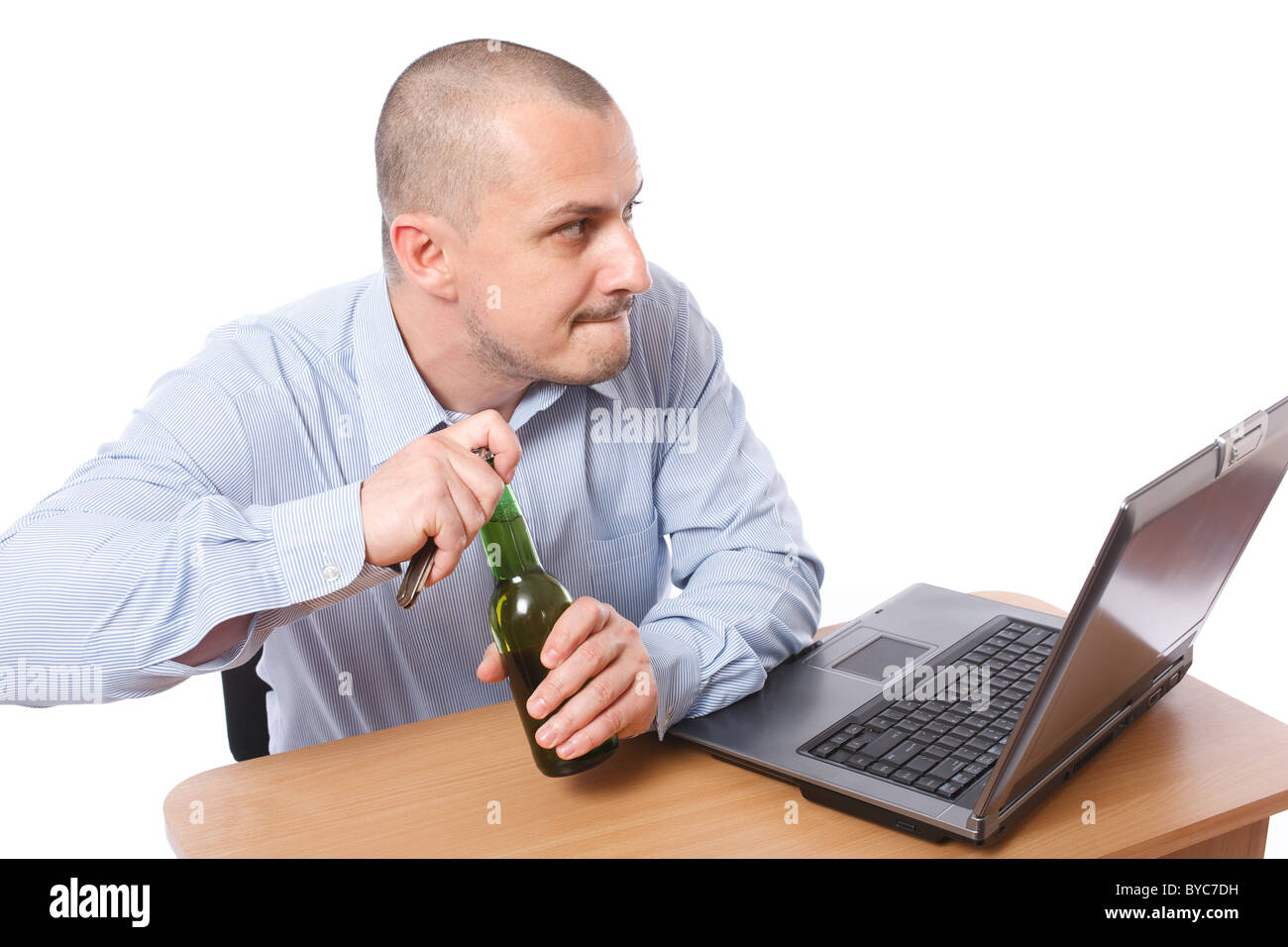 Hiding alcohol at work desk hires stock photography and images Alamy