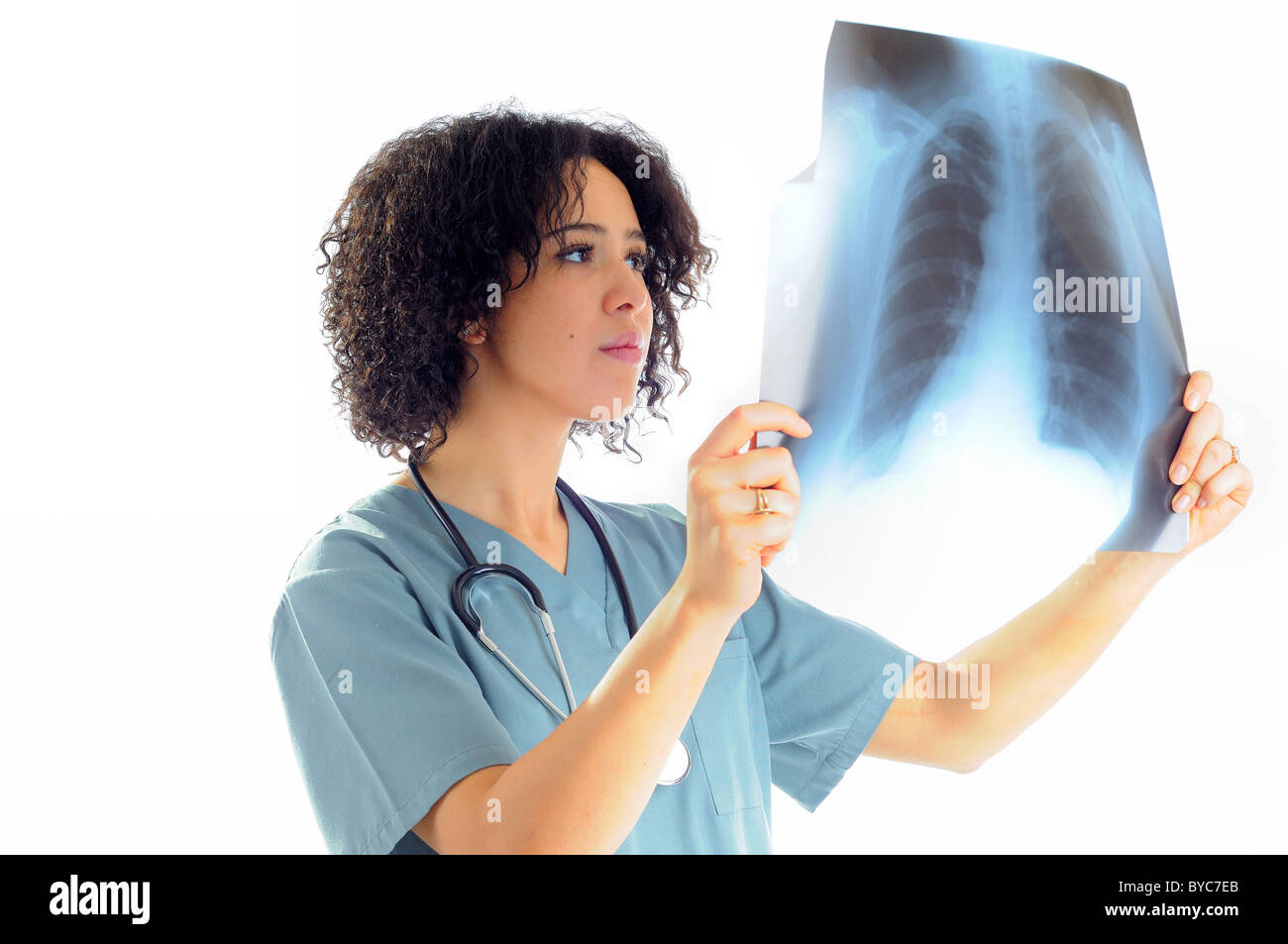 Female Nurse Looking At A Patients Chest X-Ray Stock Photo