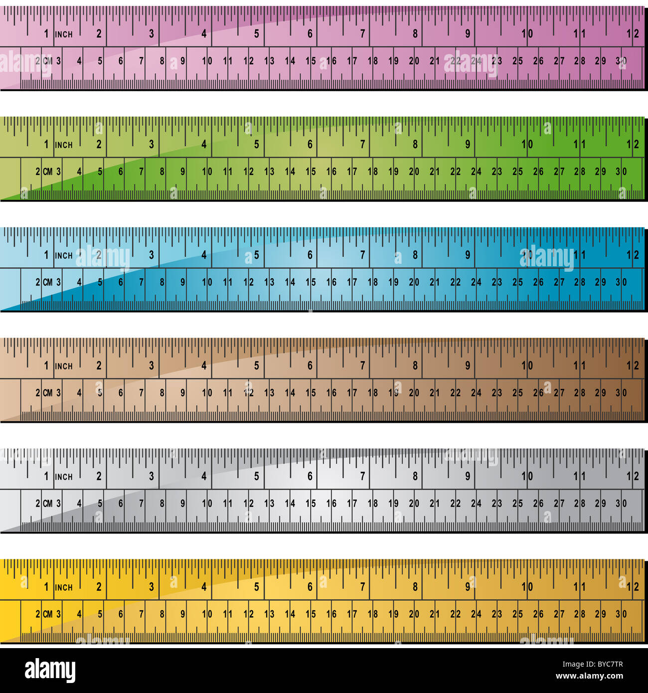 Set of 6 metal/wooden rulers with hole punch at end. Rulers measured in  inches with centimeter dashes Stock Photo - Alamy