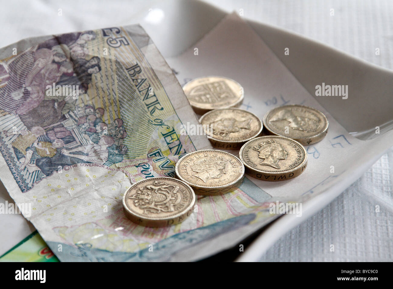 UK. MONEY TO PAY FOR RESTAURANT BILL IN LONDON Stock Photo