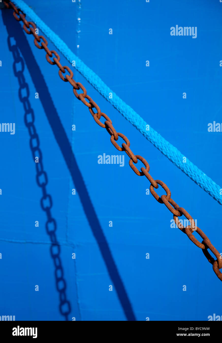 Metal chain and nylon blue rope side by side ( ship mooring ropes Stock ...