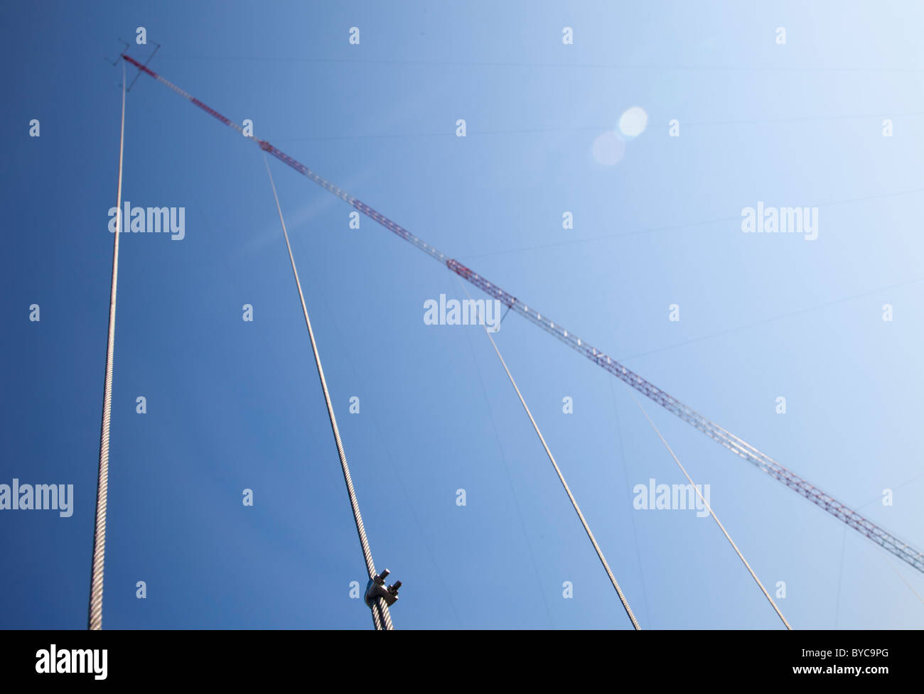 Cellular network guyed antenna tower guy wires , Finland Stock Photo