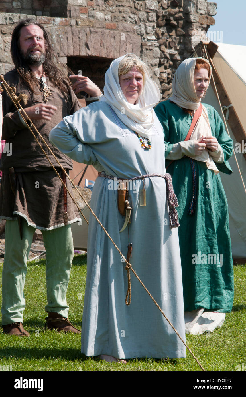 Reenactment group from the Norse period showing females and a male Stock Photo