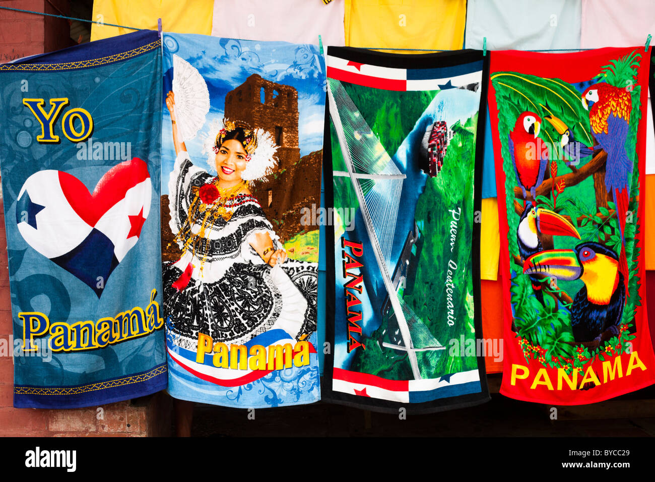 Colorful souvenirs towels from Panama with heart, dancer, toucans, parrots, nature Stock Photo