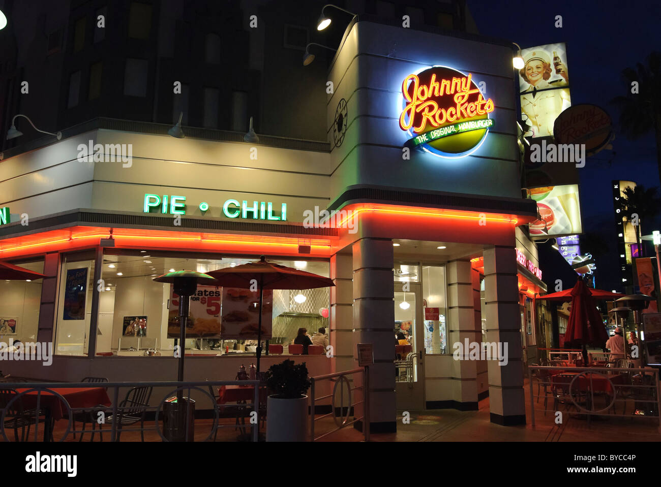 Johnny Rockets restaurant at night Stock Photo - Alamy