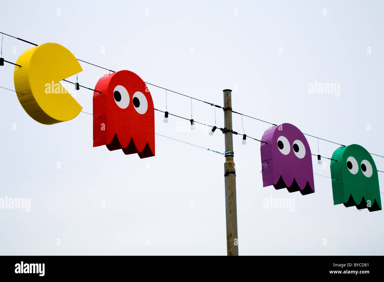 Swiss Christmas lights in shape of Pac Man / Pac Men / Pacman video game characters, by Lac / Lake Geneve. Geneva. Switzerland. Stock Photo