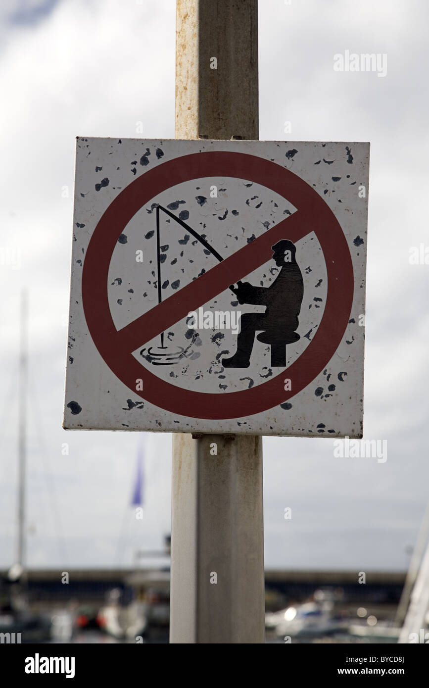 Sign no fishing, fishing not allowed, Puerto Colon, Costa Adeje, Playa de las Americas, Tenerife, Spain Stock Photo