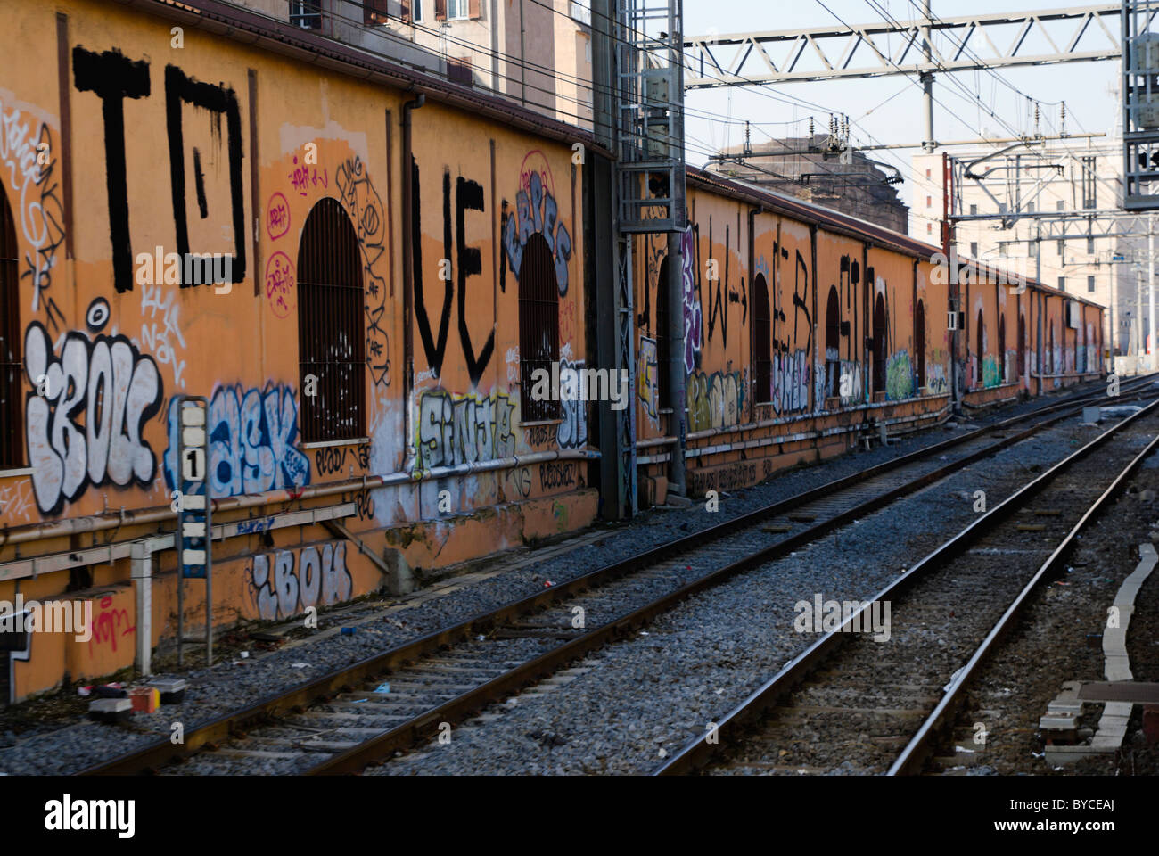 Roma Termini train tracks with graffiti Stock Photo