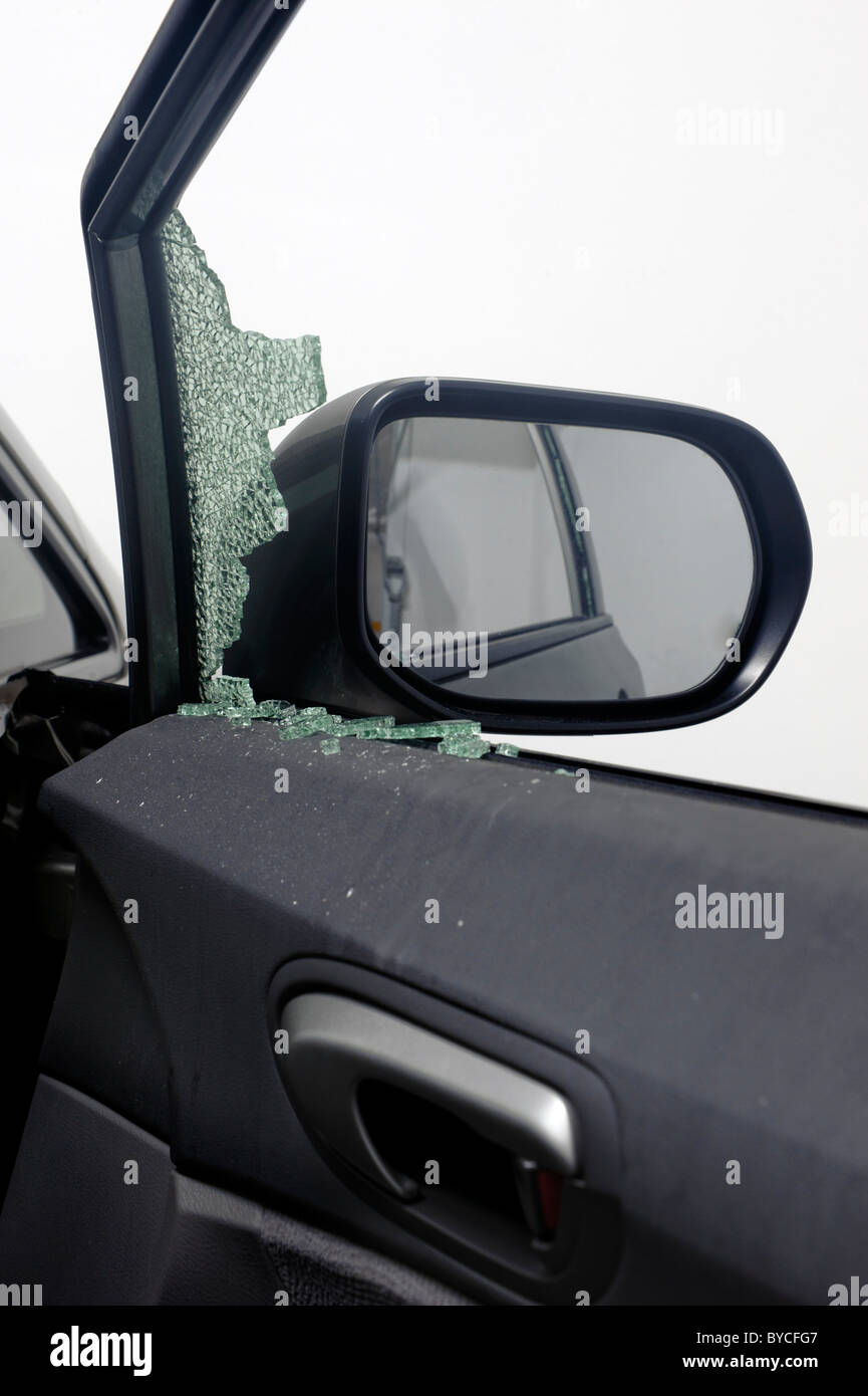Car window broken during car theft Stock Photo Alamy
