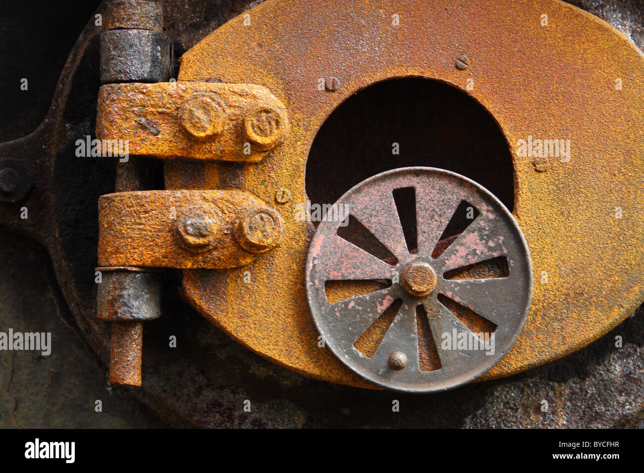 Close up of an ancient rusty boiler of a steam engine Stock Photo