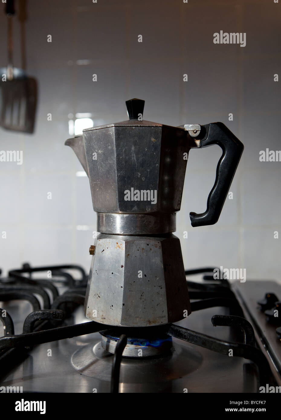 Espresso coffee in a Cuban coffee maker using a mini gas stove with a  propane tank on a single burner. A thunderstorm is brewing in the  background Stock Photo - Alamy