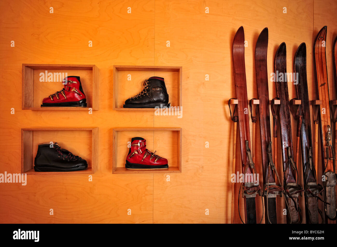 Vintage ski boots and skis on a ski lodge Stock Photo