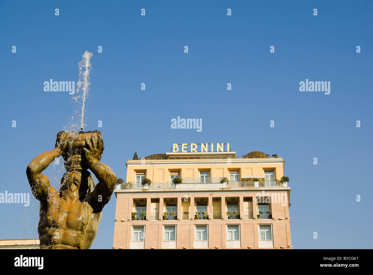 Rome, piazza Barberini, Triton Fountain by Bernini, with Hotel Bernini Stock Photo