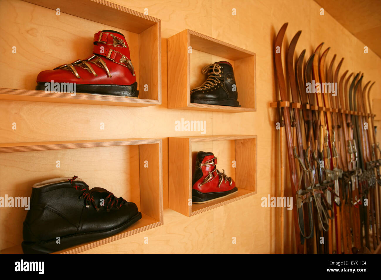 Vintage ski boots and skis on a ski lodge Stock Photo