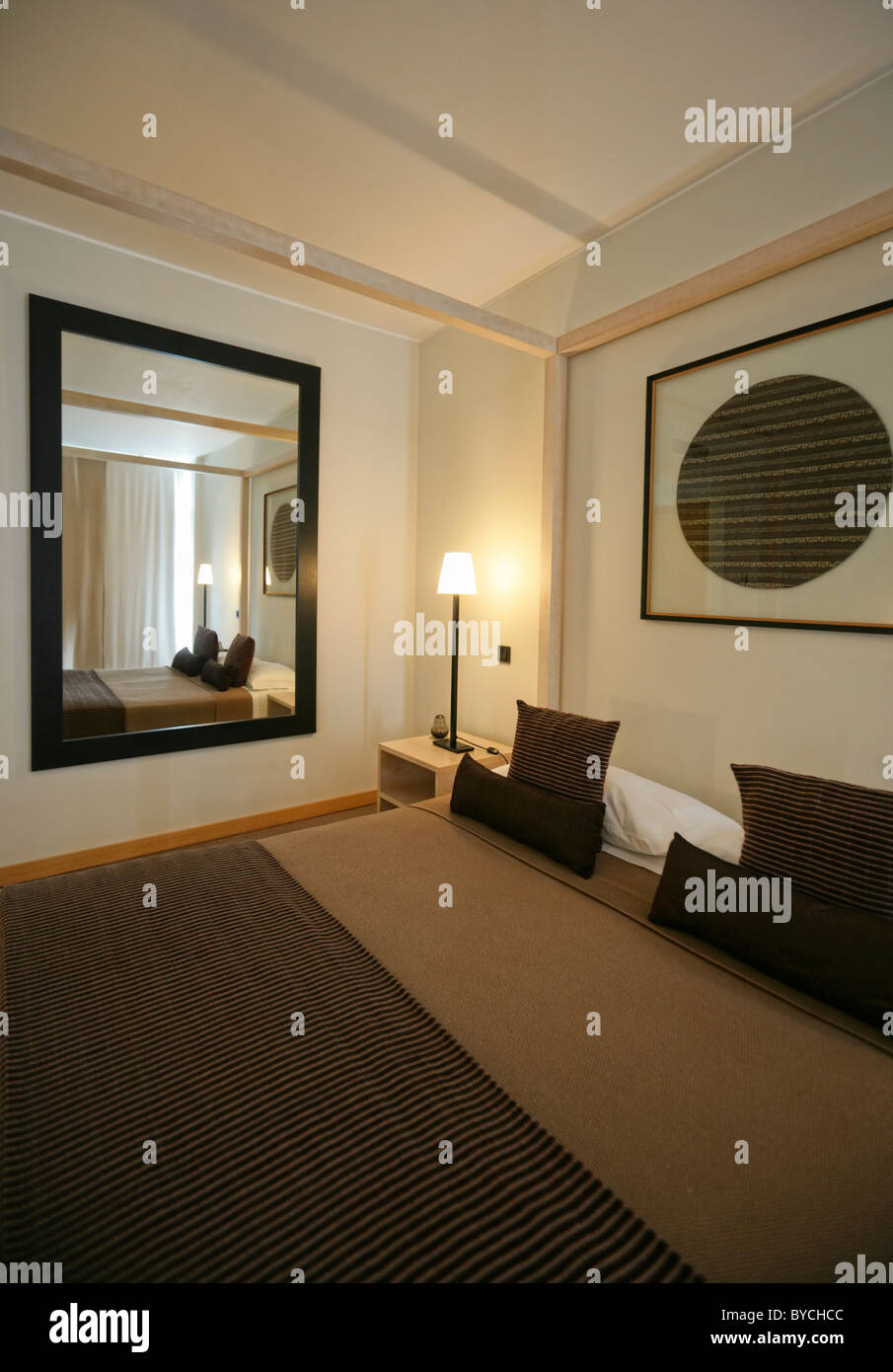 Bedroom with canopy bed and mirror Stock Photo Alamy
