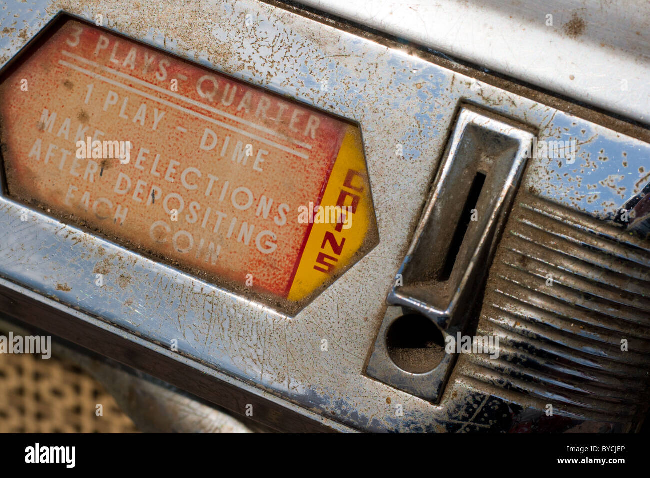 Vintage jukebox coin input Stock Photo