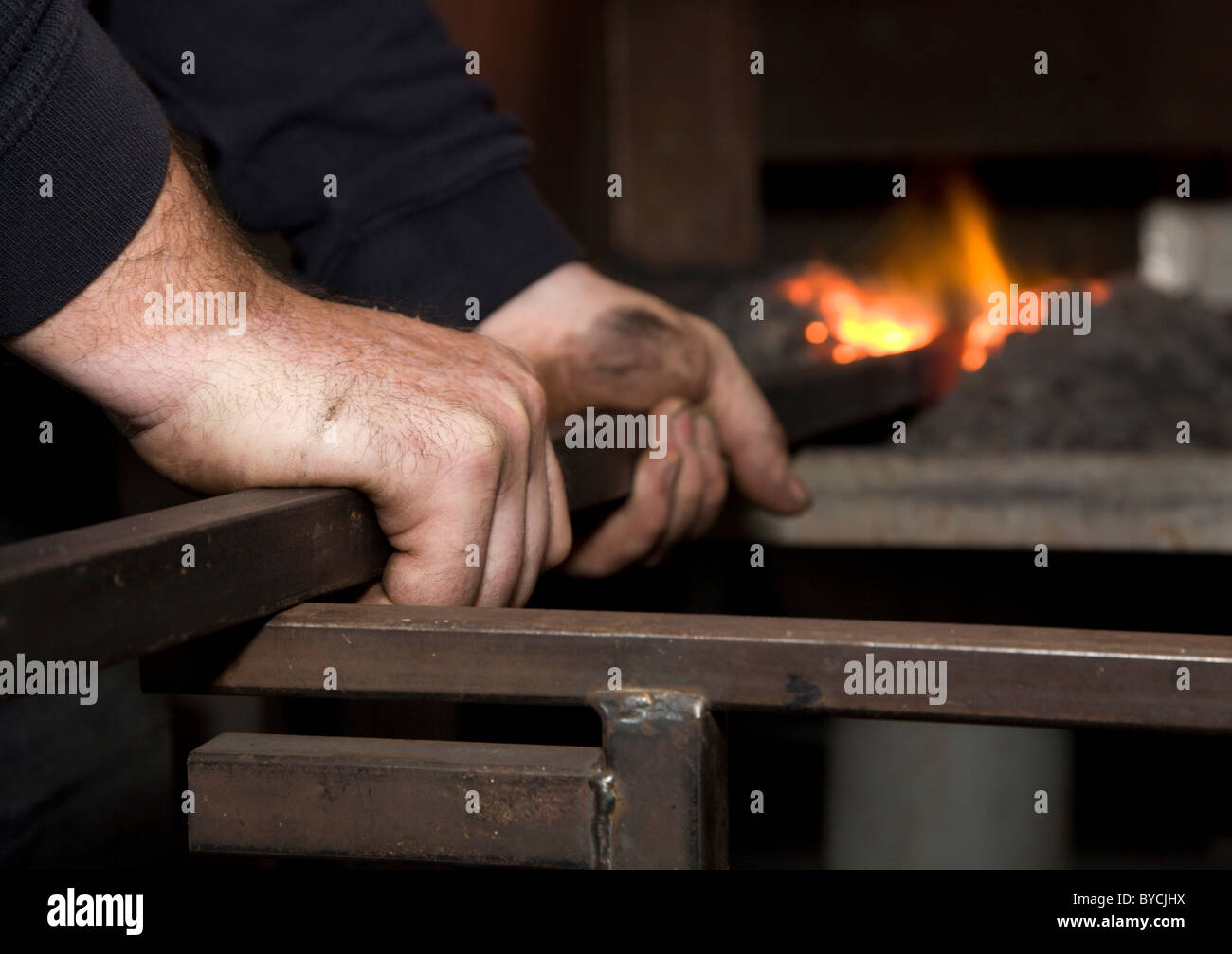 hands of smith by the work Stock Photo