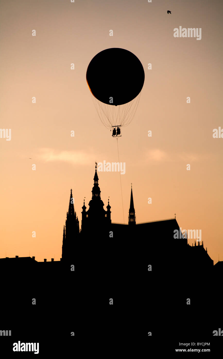 Prague - balloon and silhouette of st. Vitus cathedral - evening Stock Photo