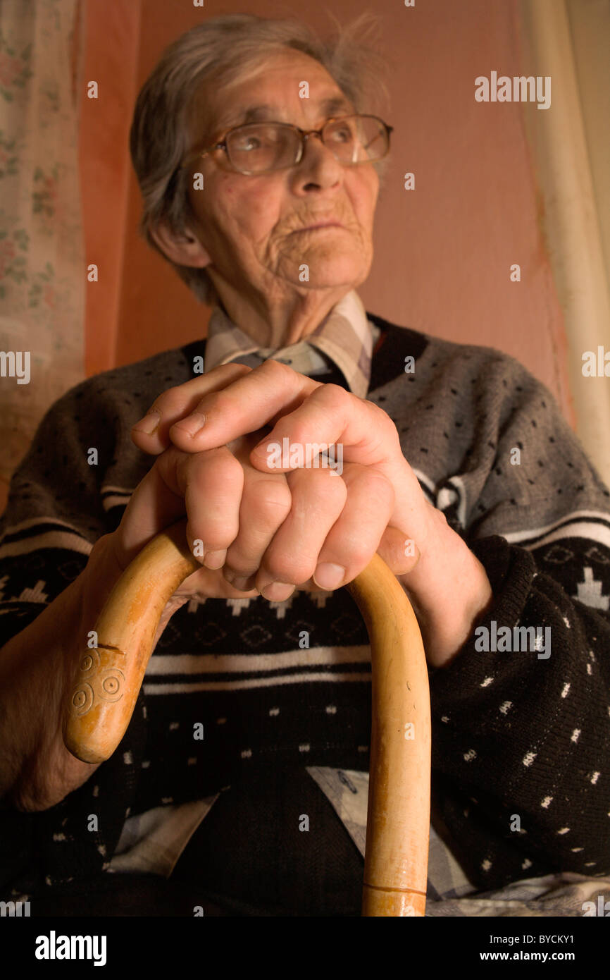 old woman with the staff Stock Photo