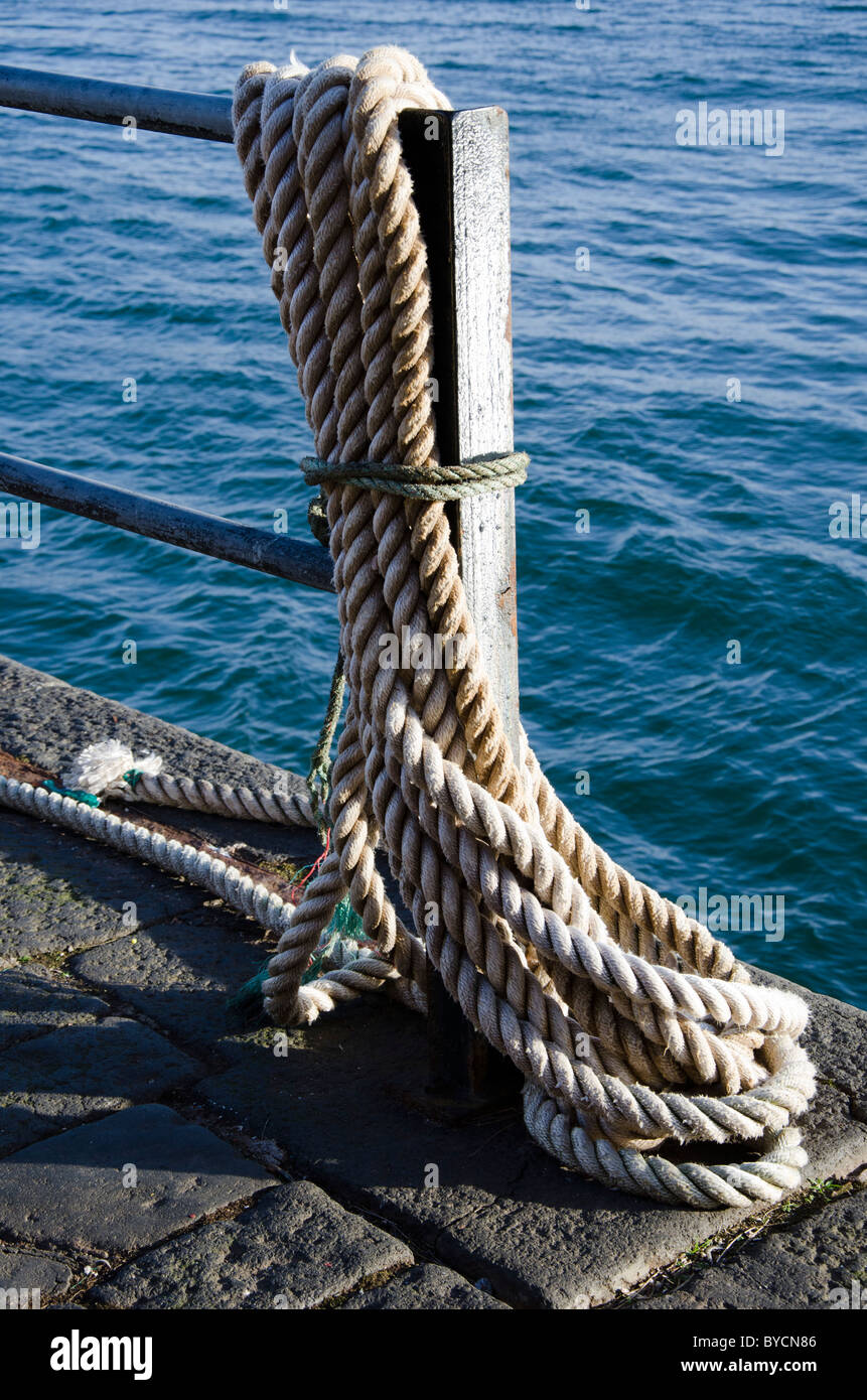 Rope tied to harbour railings in Dunbar, East Lothian, Scotland Stock ...