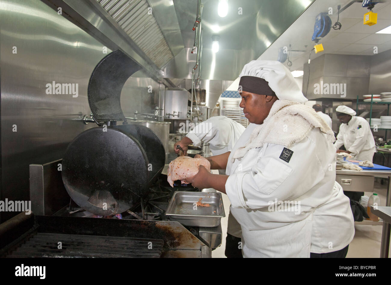 Roseville, Michigan - A student prepares food at the Dorsey Culinary Academy, a private career training school. Stock Photo