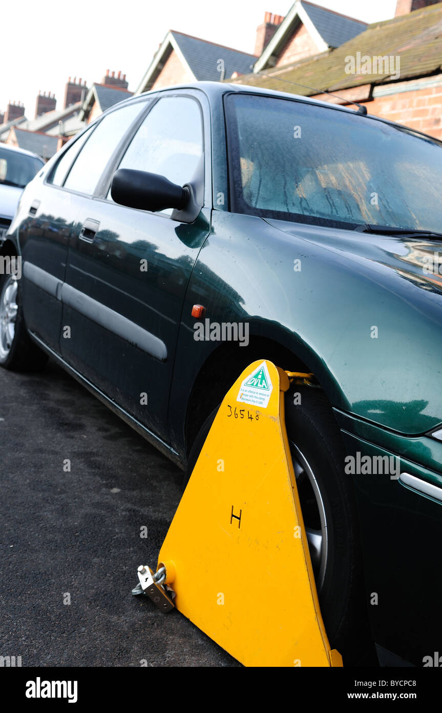 Car Taxing Wheel Clamping Stock Photo Alamy