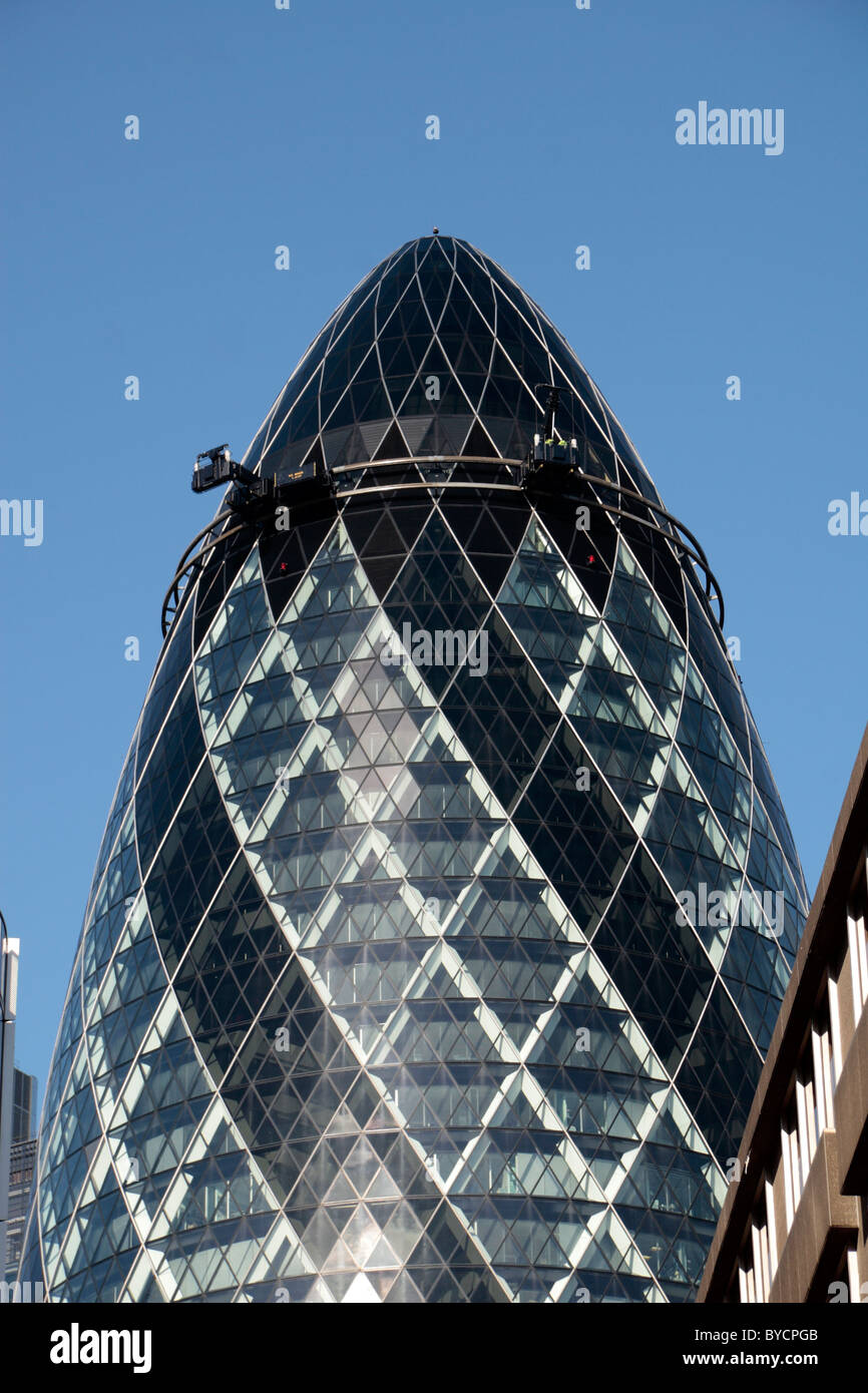 The top of the Swiss Re building, 30 St Mary Axe, London, UK otherwise known as the Gherkin. Stock Photo