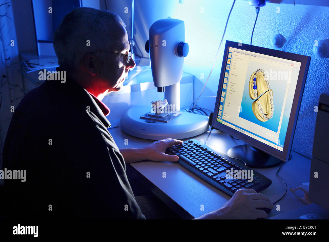 Dental laboratory, dental technician at work, tooth prosthesis, health