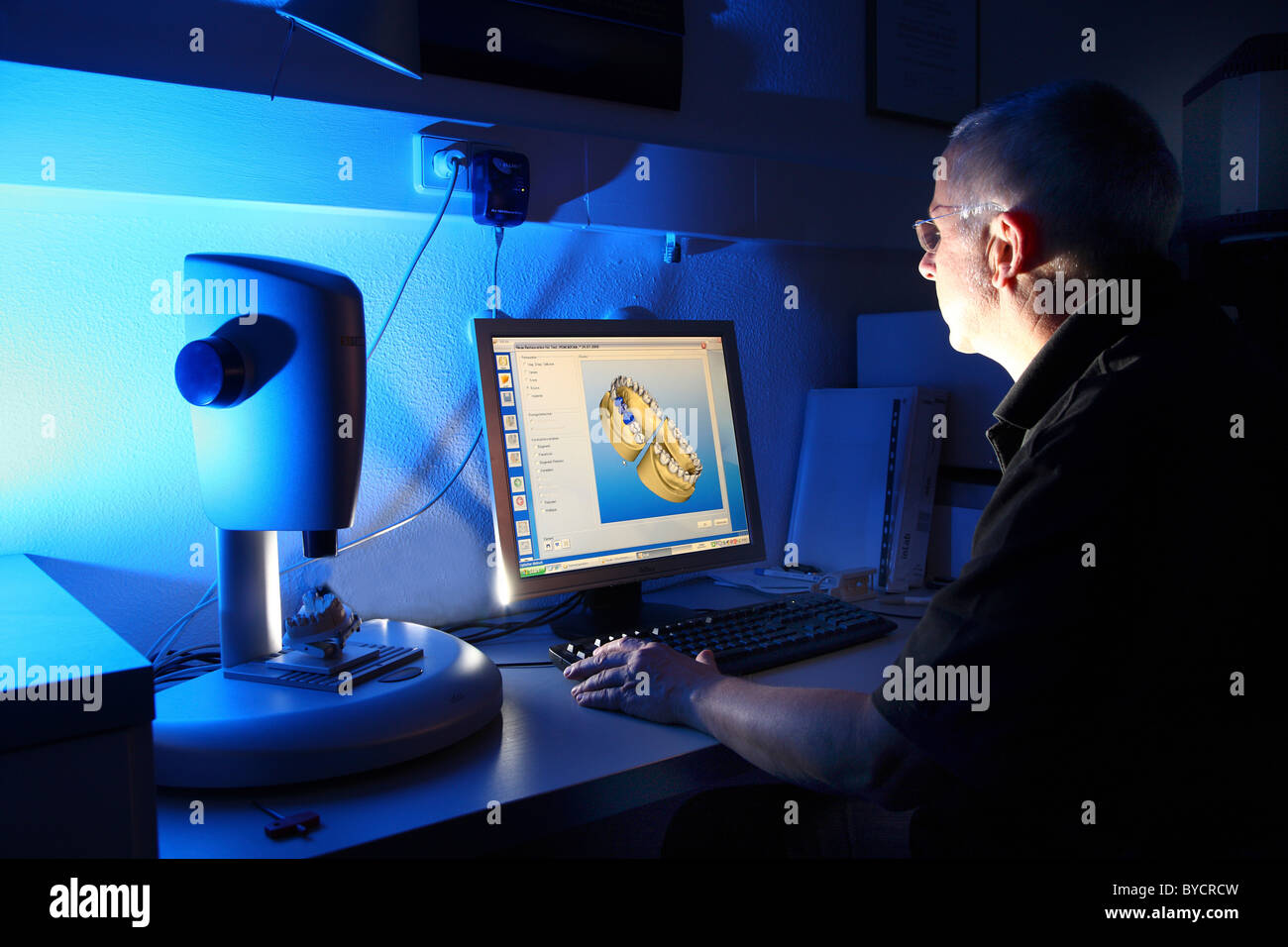 Dental laboratory, dental technician at work, tooth prosthesis, health