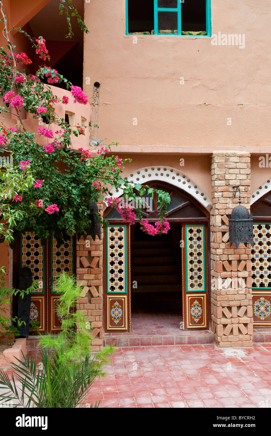 Hotels and restaurants with bougainvillea flowers and Moroccan architecture in Dades Canyon, Morocco. Stock Photo