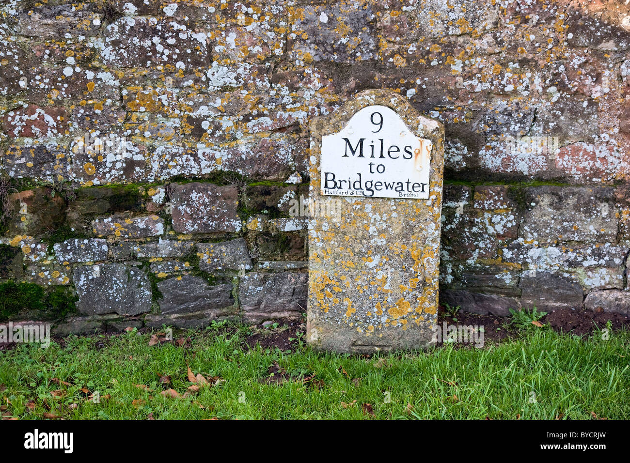 Charming old milestone at Cothelstone manor in the Quantock hills near Taunton Somerset Stock Photo