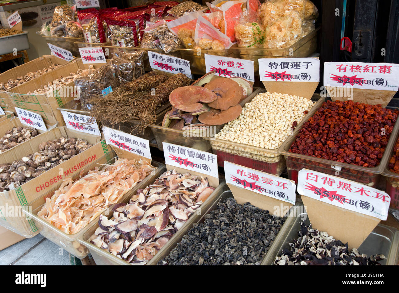 Chinese ingredients outside a food shop in Chinatown, New York City, USA Stock Photo