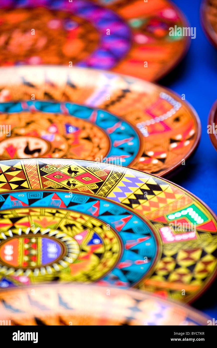 Colourful typical and traditional plates on sale / display at a local market, Peru, South America. Stock Photo