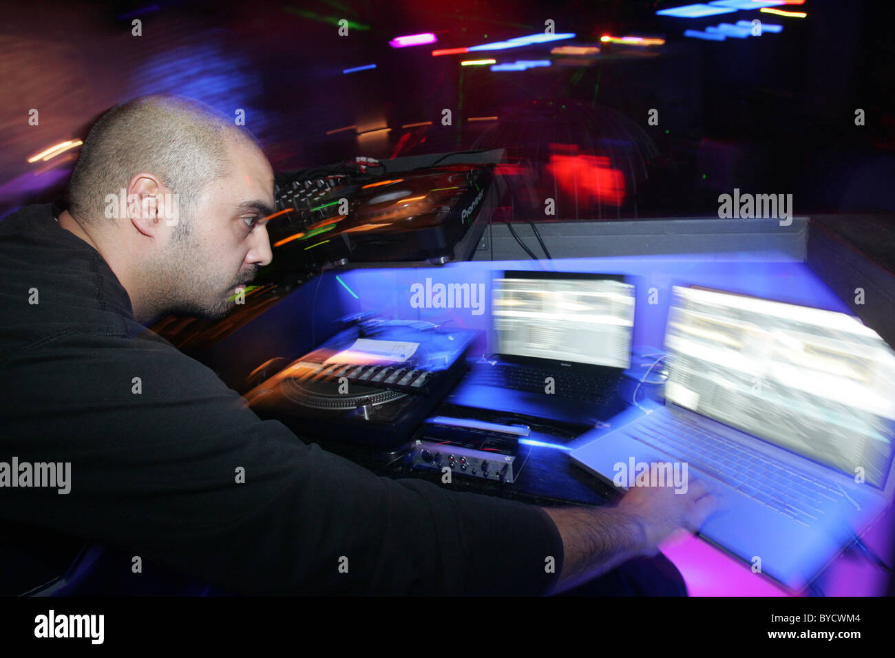 Dj using his laptop Stock Photo Alamy