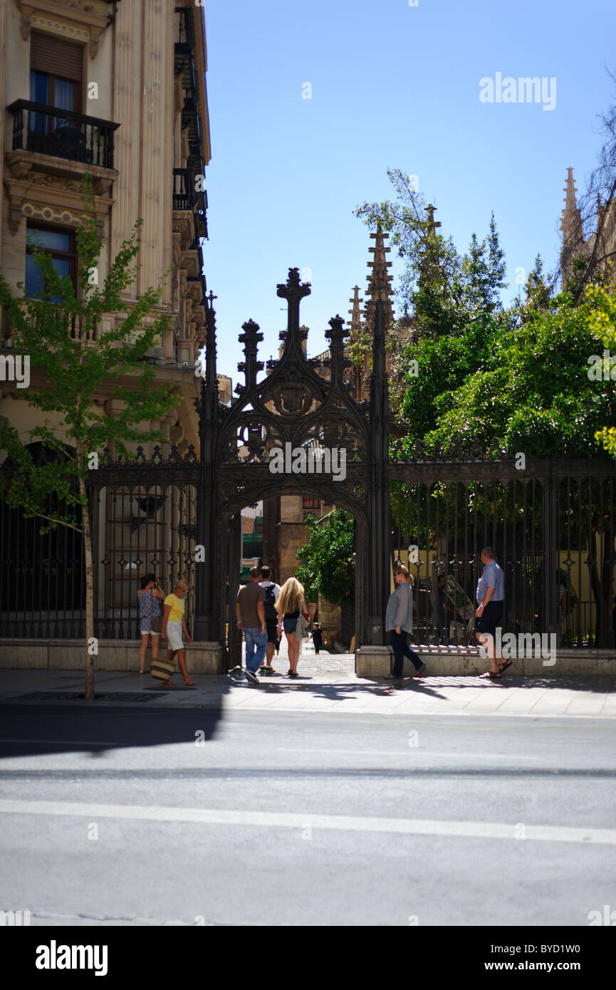 In Granada, Spain people walking along Gran Via and turning through a