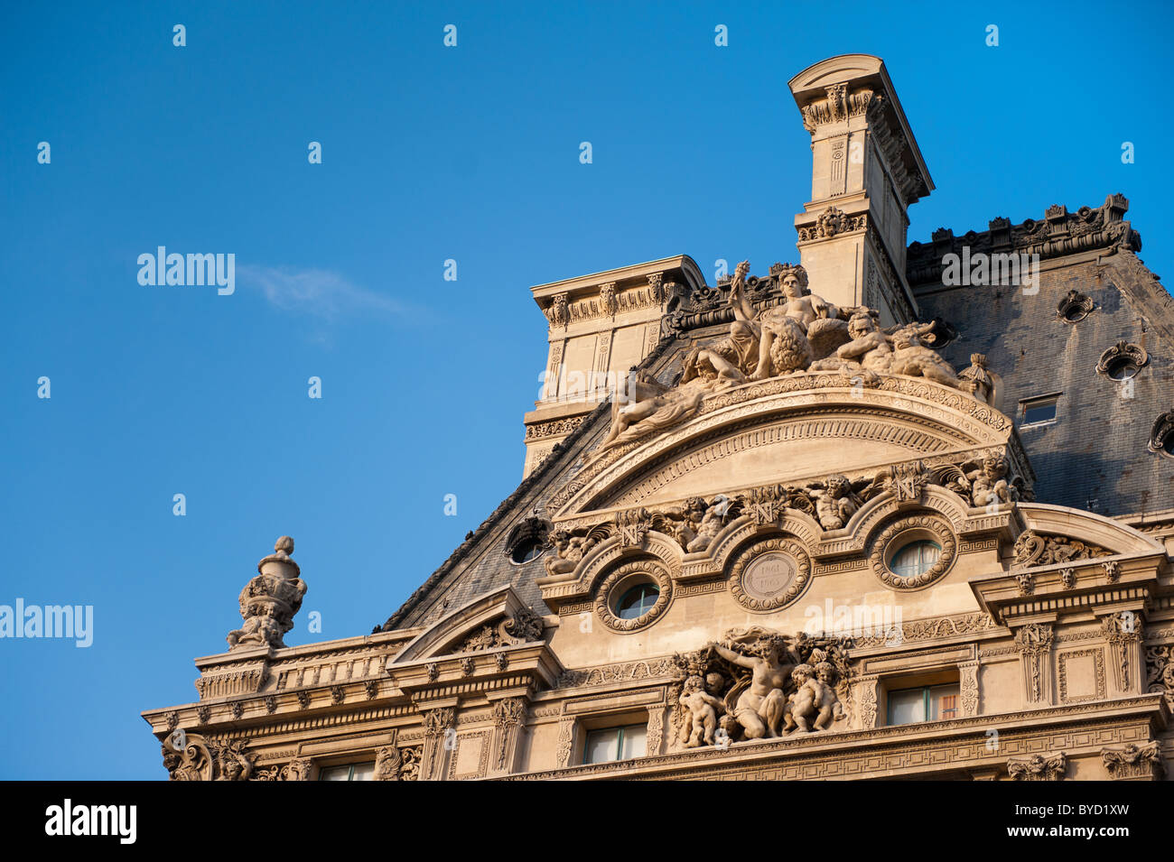 Sculptures on the building Louvre in Paris Stock Photo Alamy