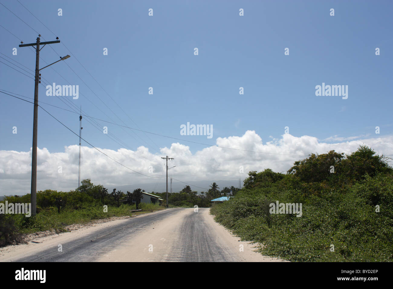 Dusty road near Puerto Villamil on Isla Isabela in the Galapagos Islands Stock Photo