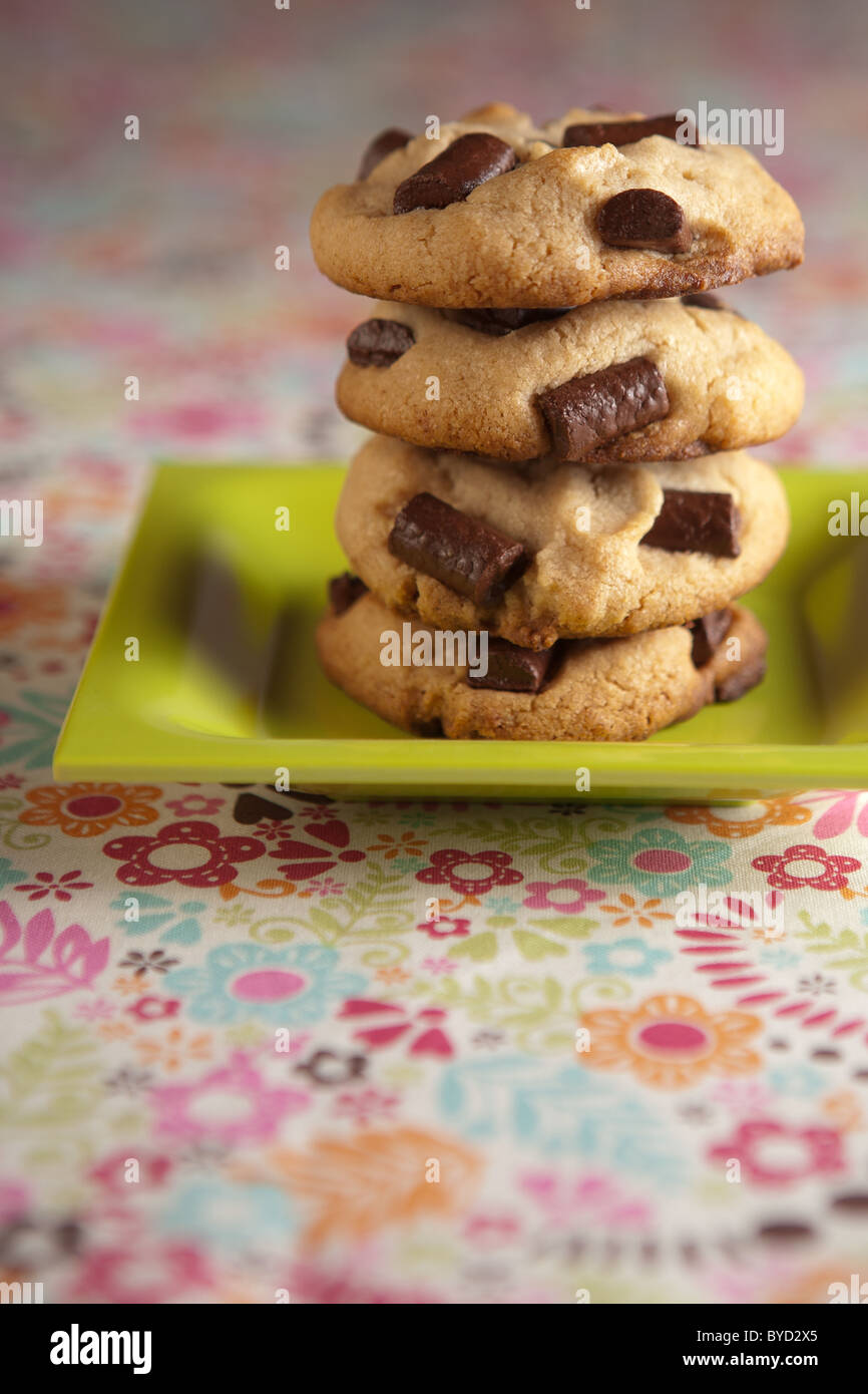 stack of chocolate chip cookies on colorful plate Stock Photo