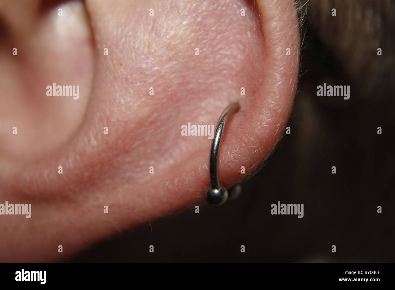 Pierced ear Stock Photo